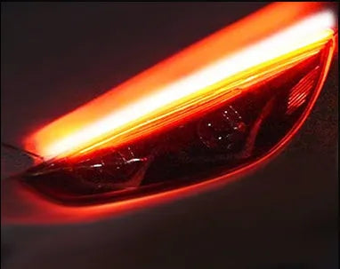 Car LED daytime running light strip with flowing turn signals in silicone waterproof construction