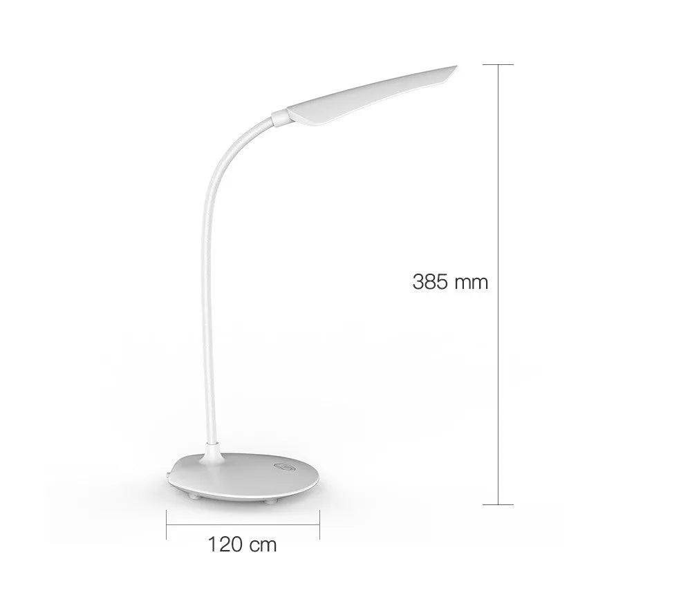White LED desk lamp with USB charging cord and touch switch on a wooden desk