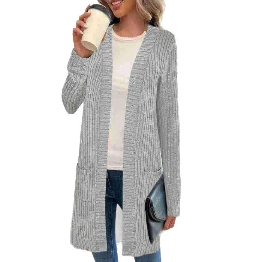 Long sleeve loose fit knitted cardigan jacket with pockets shown in black, grey, or wine red.