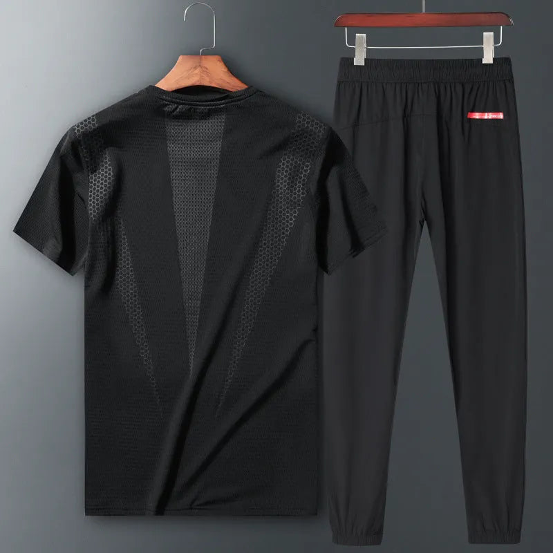 Two-piece nylon sportswear set with short-sleeved round-neck T-shirt and trousers in black blue and white