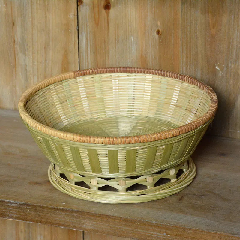 Handmade natural bamboo storage basket in traditional woven construction