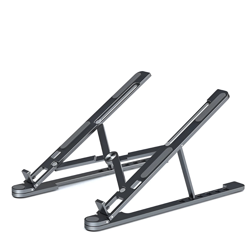 Deep grey foldable aluminium laptop stand holding a silver laptop at an angle.