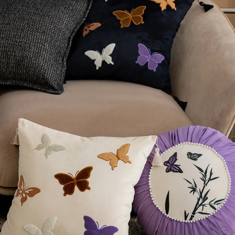 Square beige, black, and purple cushion with Chinese-style butterfly embroidery