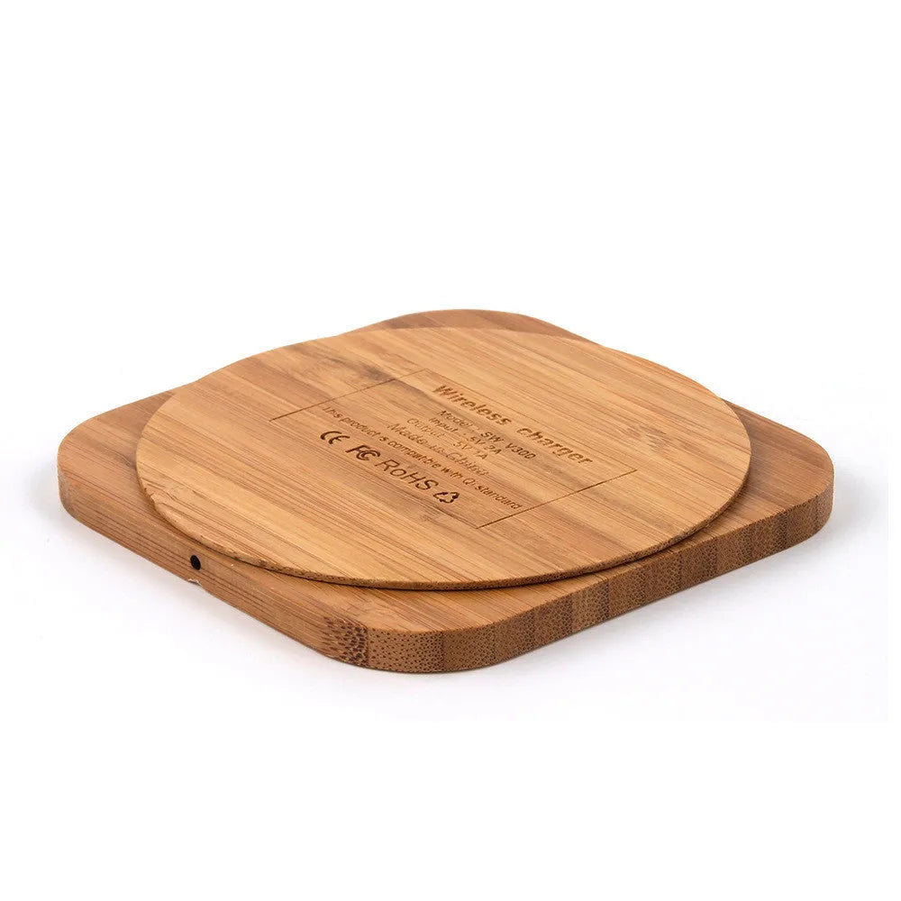 Square wooden bamboo 5W wireless charging pad for smartphones on a desk