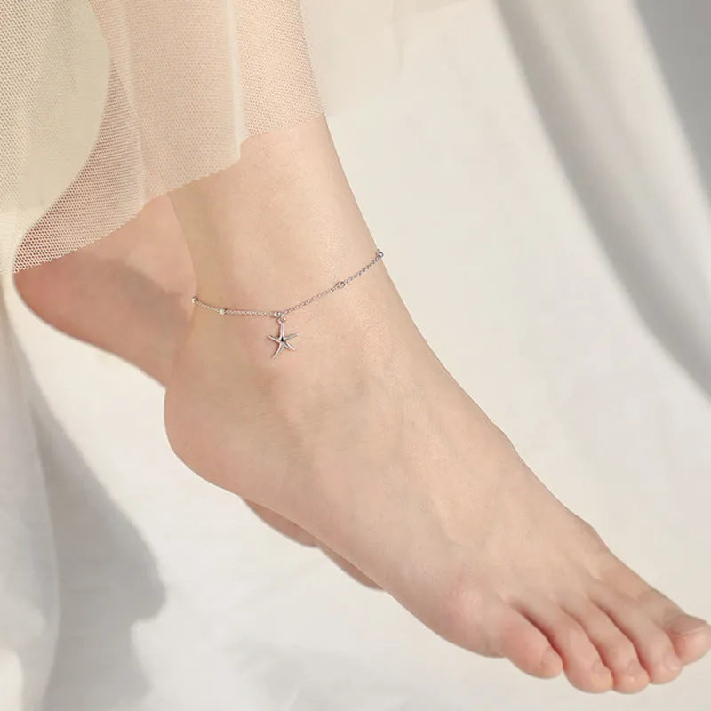 S925 sterling silver anklet with a starfish charm on a round beaded chain.