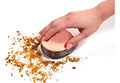 Gold portable mini desktop vacuum cleaner 18x12x10 cm on a wooden desk