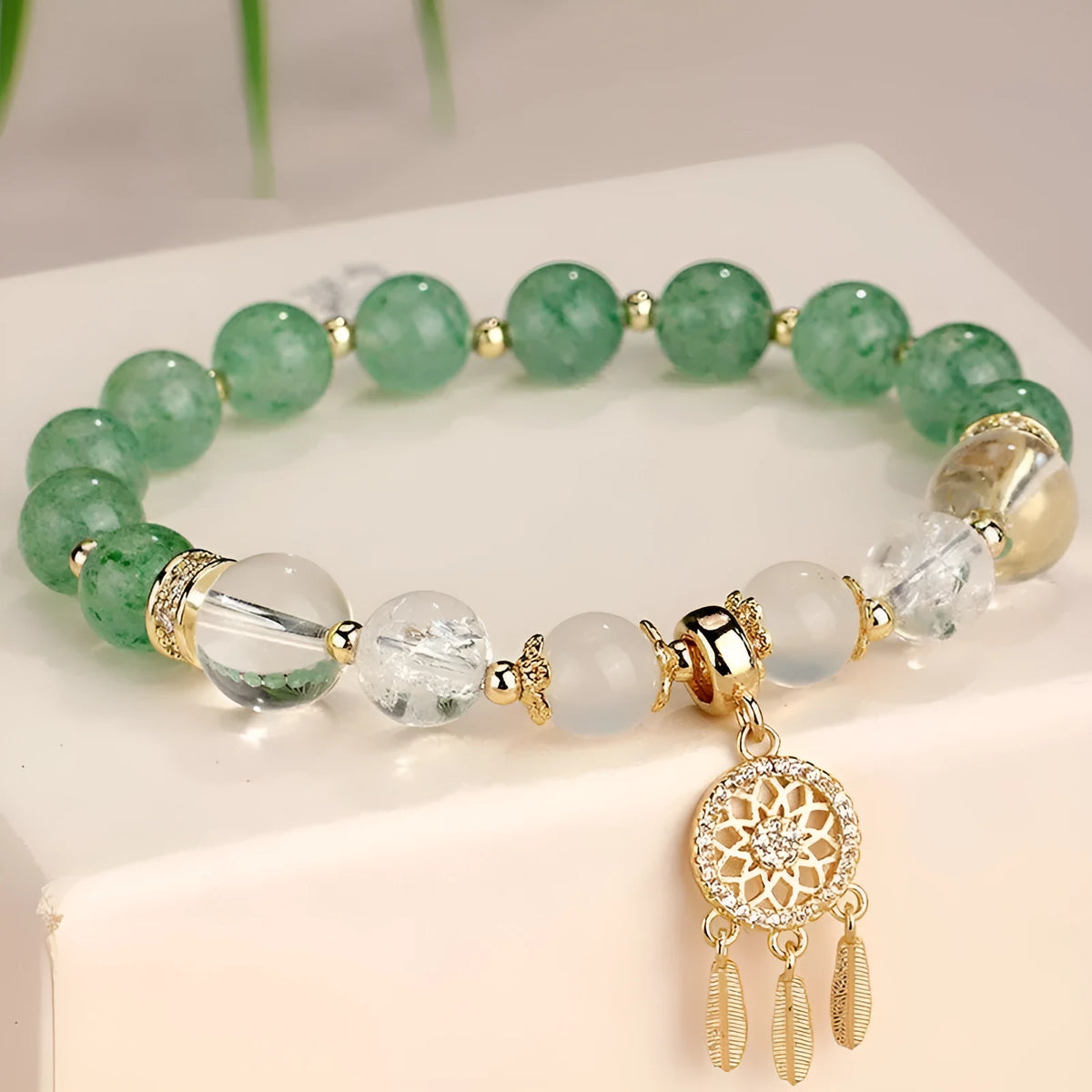 Korean style tassel bracelet with gemstone beads in seven colour options featuring electroplating finish