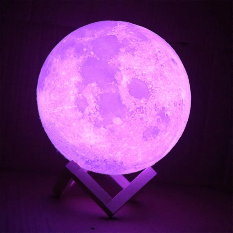 3D printed moon lamp showing detailed craters, with a touch metal ring at base for colour changing and dimming control.