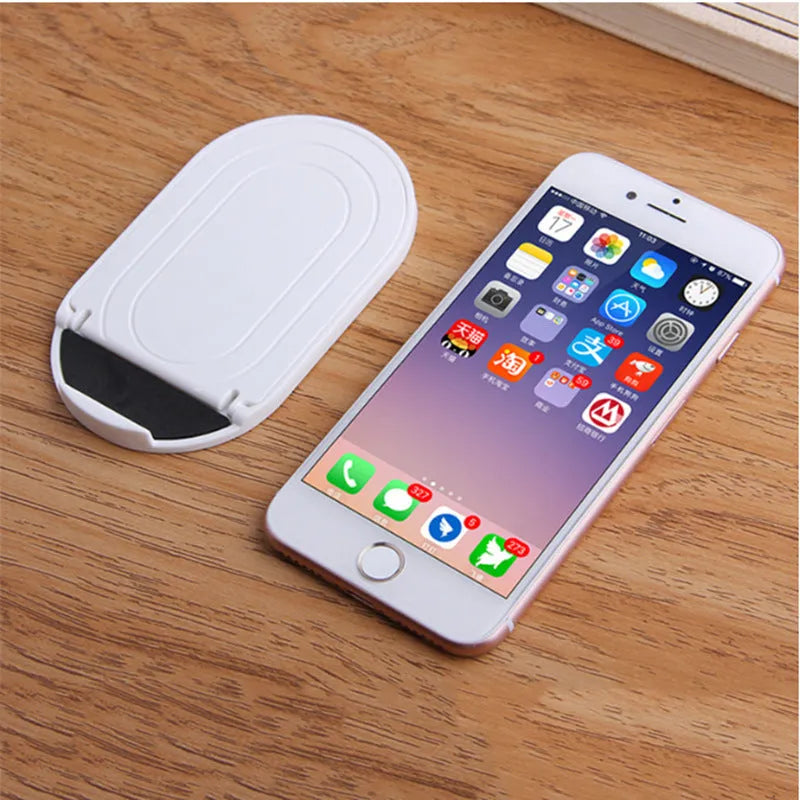 Plastic Lazy Bracket adjustable mobile phone stand in six colour options.