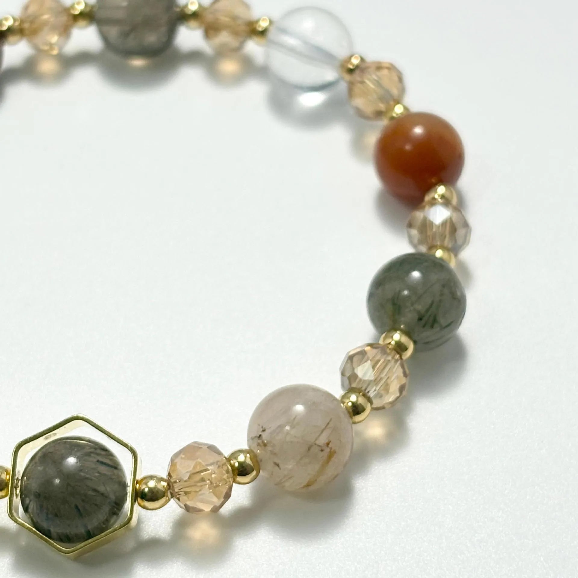 Gold luxury bracelet with 8mm crystal beads featuring constellation modelling and auspicious symbol ornaments