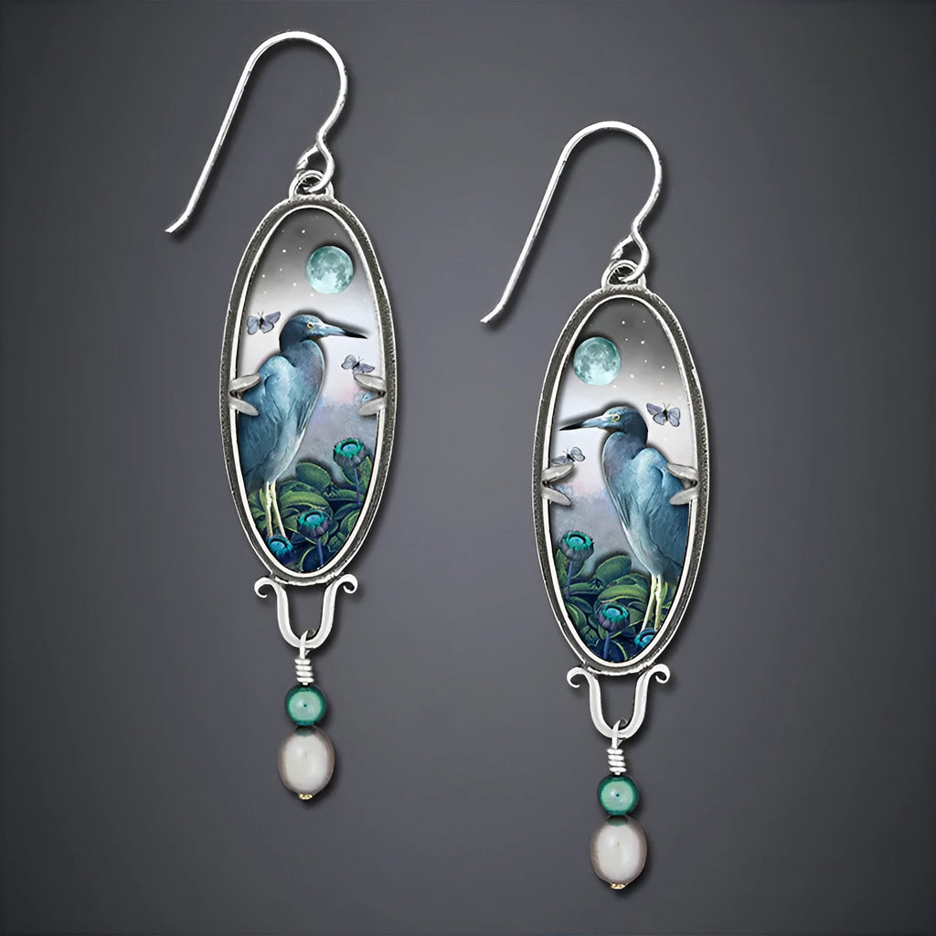 Silver retro bird flower drop earrings with electroplated finish showing detailed palace motif