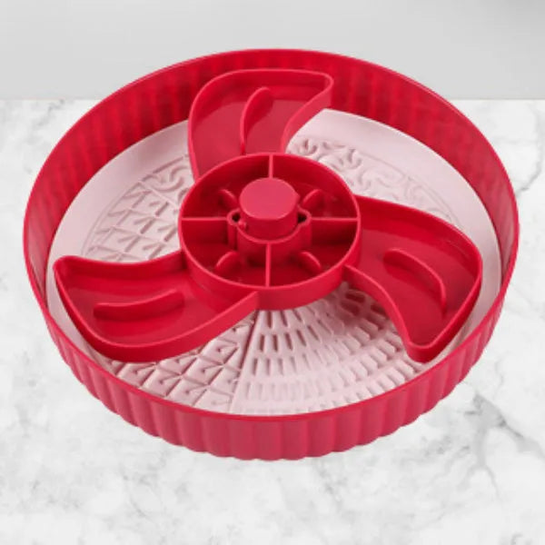 Slow feeder pet bowl with rotating game board, anti-choke silicone pad, and interchangeable licking mat in blue.