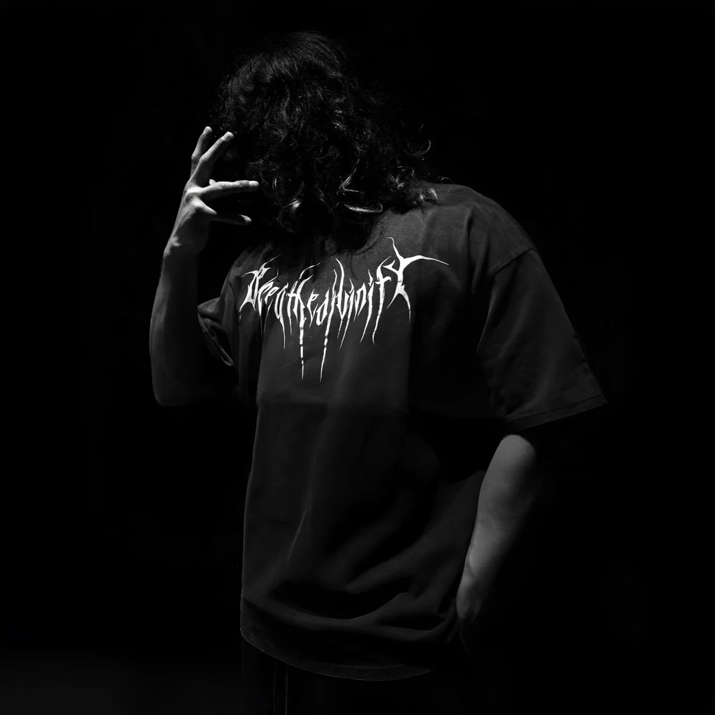 Dark style plus size cotton short sleeve T-shirt with gilding craft detail on a mannequin.