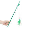 Green interactive cat feather wand toy with bells and feathers for indoor play and training