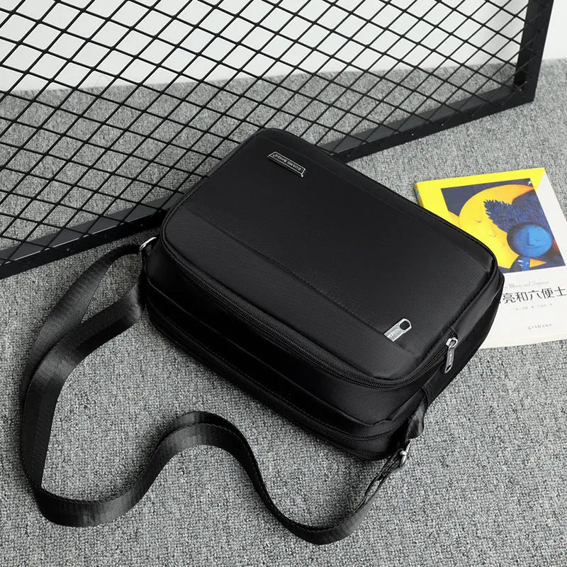 Men's black Oxford cloth horizontal multi-layer messenger bag for daily matching