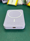 White magnetic wireless charger power bank with 5000mAh capacity measuring 100x65mm