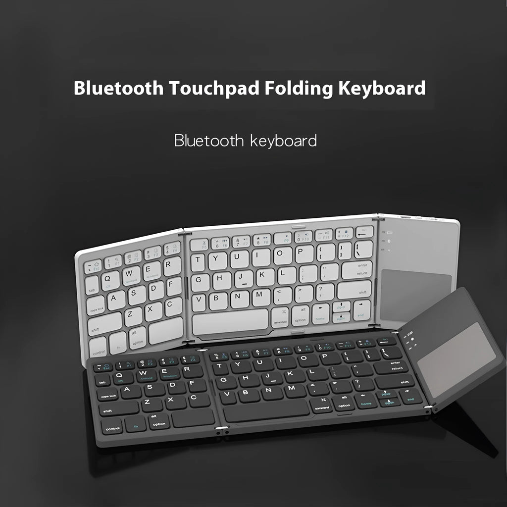 Black tri-fold portable Bluetooth keyboard shown open next to a smartphone, highlighting its slim profile.