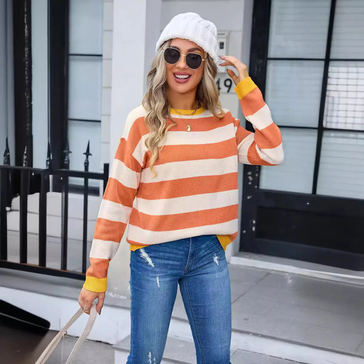 Women's loose fit long sleeve striped acrylic sweater in blue colour