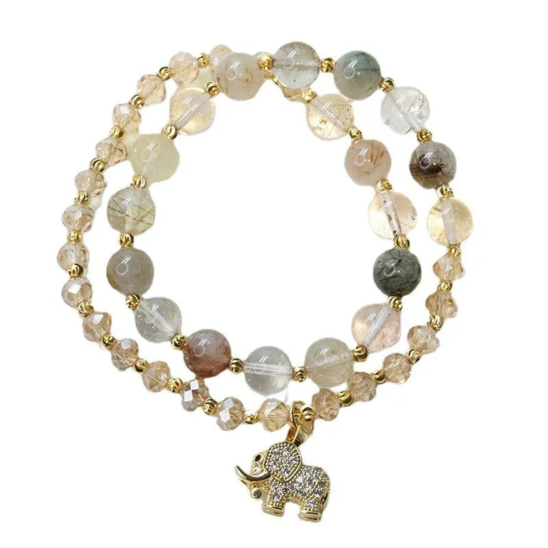 Retro style women's bracelet made with colour hair crystal and a strawberry quartz gemstone.