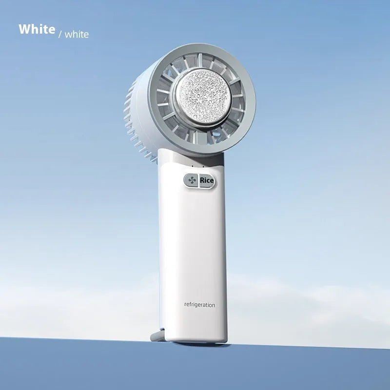 White handheld portable fan with turbo jet airflow and ice cooling function showing compact design