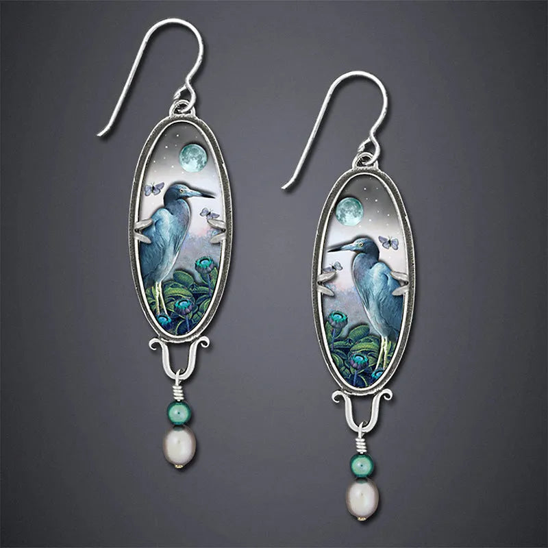 Silver retro bird flower drop earrings with electroplated finish showing detailed palace motif