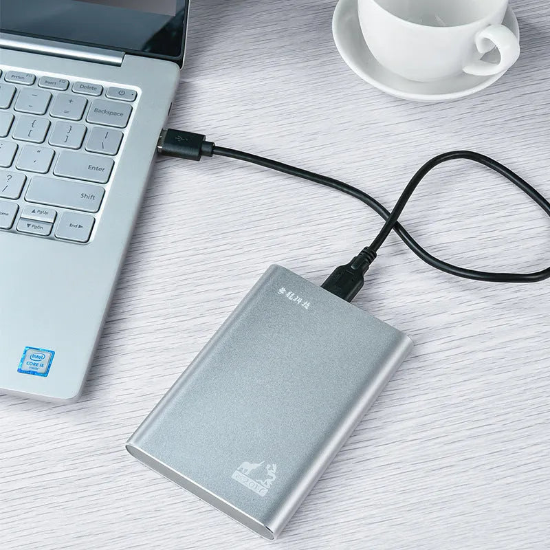 2.5 inch metal external hard drive in black with USB 3.0 cable and indicator light
