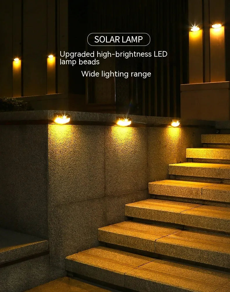 Solar-powered outdoor wall lamp with smiling face design for garden lighting