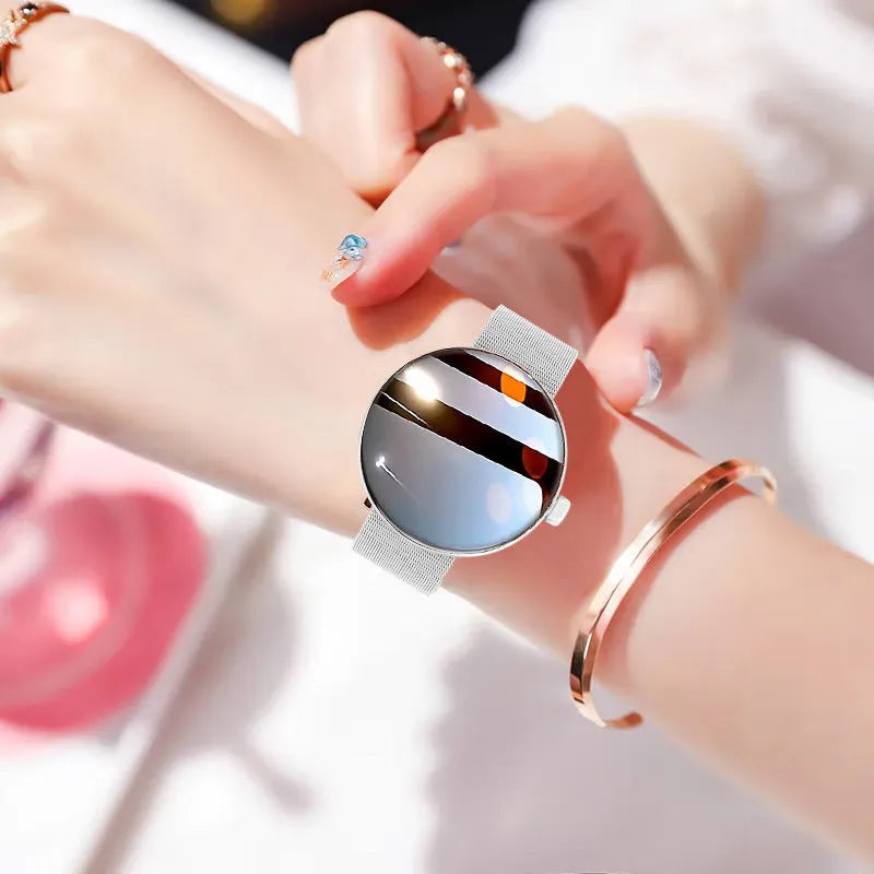 Smart watch with colour touch screen display and metal strap on wrist
