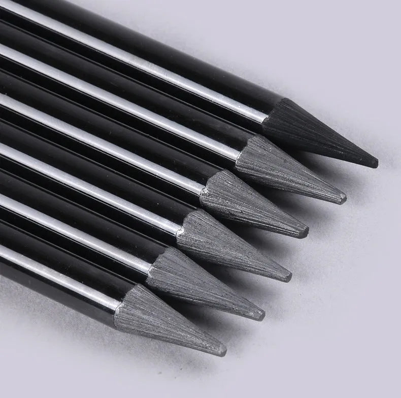 Graphite and carbonized pencil drawing set with wooden shells on suction card packaging