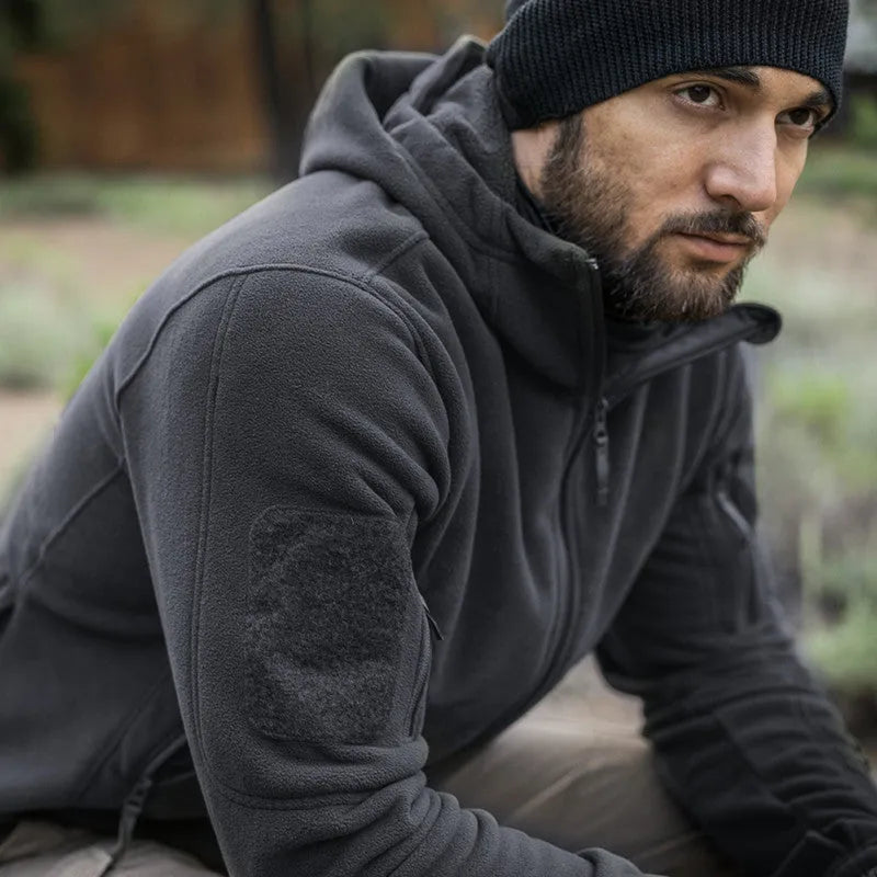 Men's military tactical jacket in Army Green with warm hood, soft shell fabric for outdoor hiking and sports