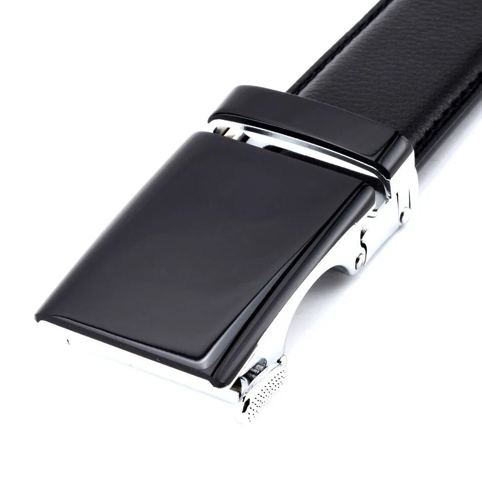 Men's cowhide automatic buckle business belt in black on a neutral background showing the buckle.