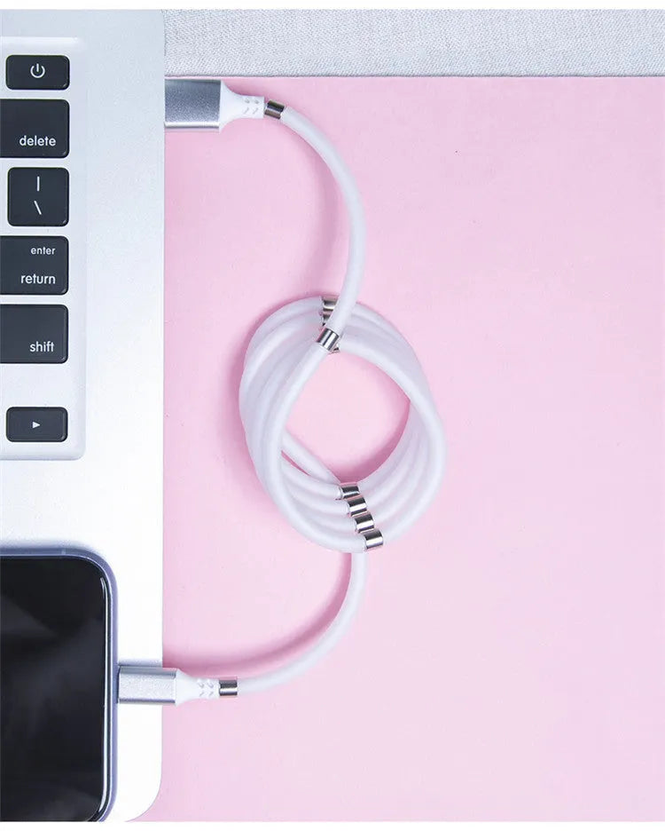 Black magnetic data cable showing Micro USB, USB Type-C and 3.5mm connector interfaces with ends snapped together