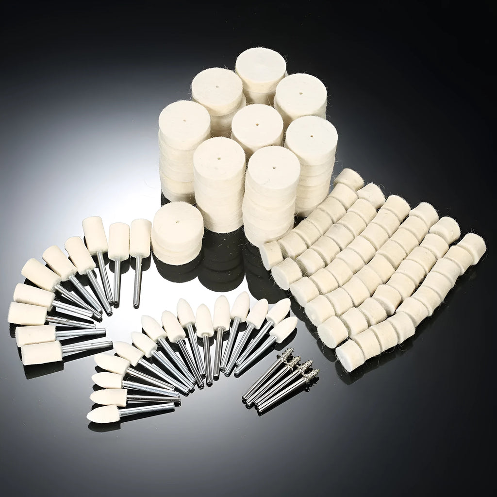129 piece polishing wheel kit with white wool brushes and metal handles on a table