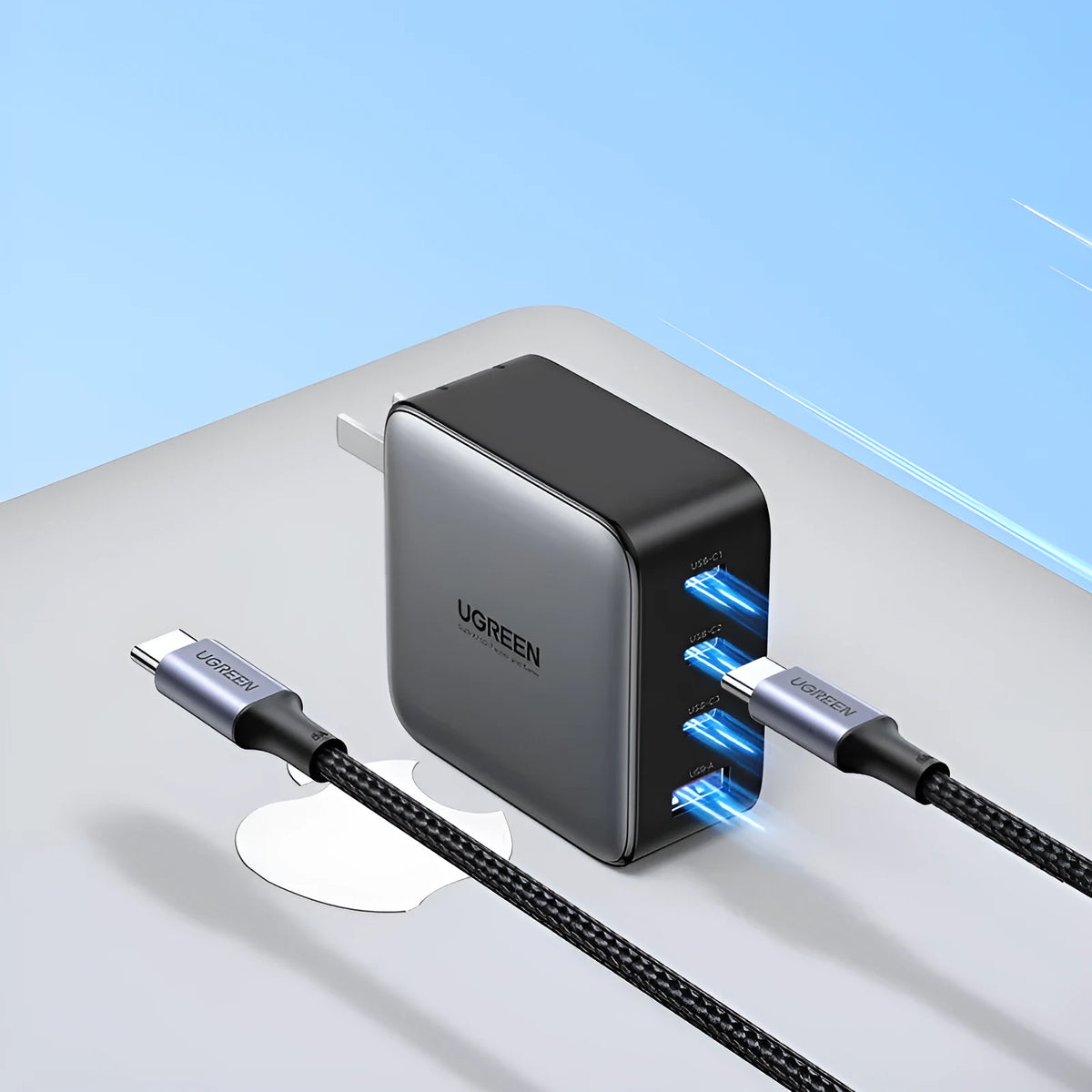 100W Gallium Nitride GaN multi-port USB-C fast charger plug on a table