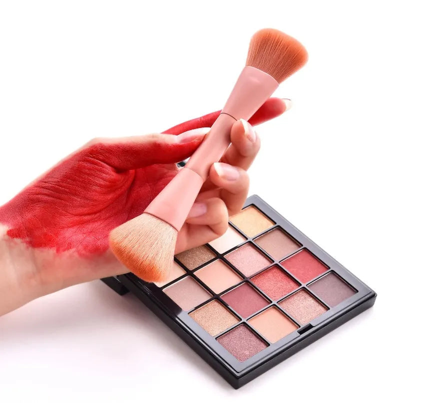 10 professional makeup brushes with wooden handles in a pink case including foundation, powder, and dual-ended brushes