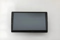 10.1 inch universal Android car stereo head unit with trapezoid touch screen display for dashboard installation.