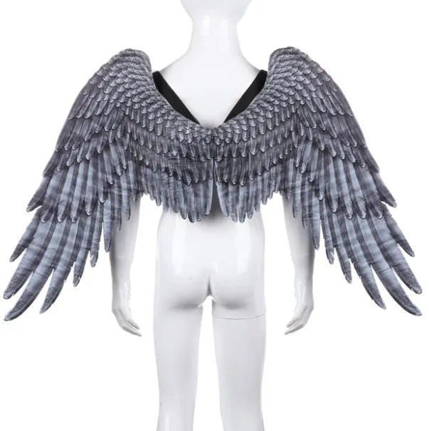 Halloween 3D angel wings in white non-woven fabric with elastic straps on child