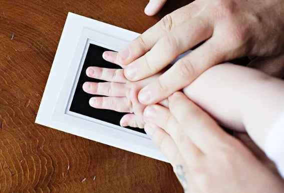 Non-toxic baby handprint and footprint kit with wash-free ink and printing table in black colour option