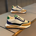 Men's thick sole retro lace-up dad shoe in synthetic leather on a white background.
