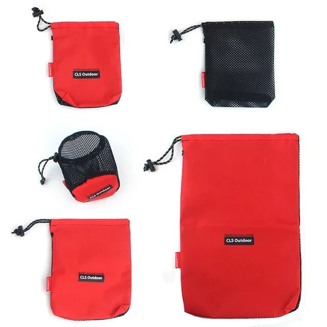 Red five-piece travel storage bag set with mesh panels and zipper closures