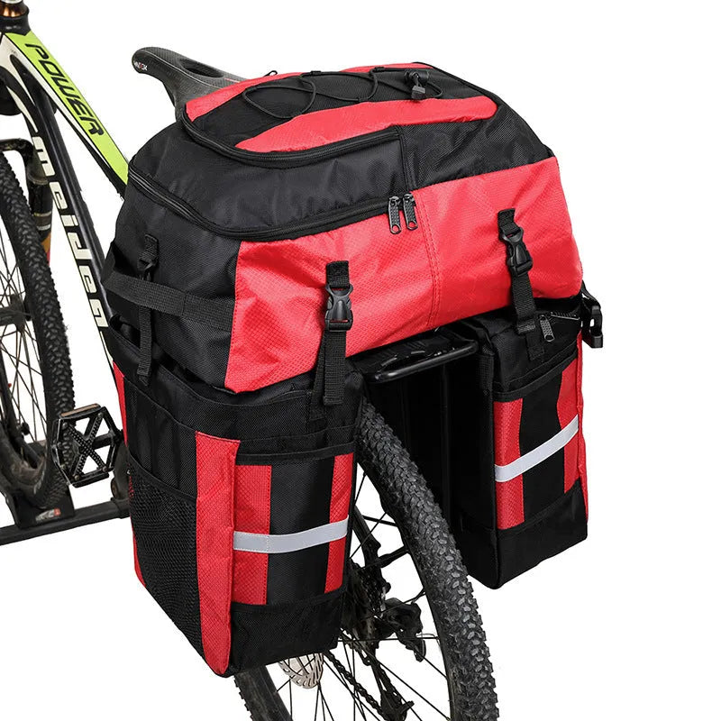 Rhinoceros bicycle rear storage bag with 70L capacity in green colour mounted on bicycle frame