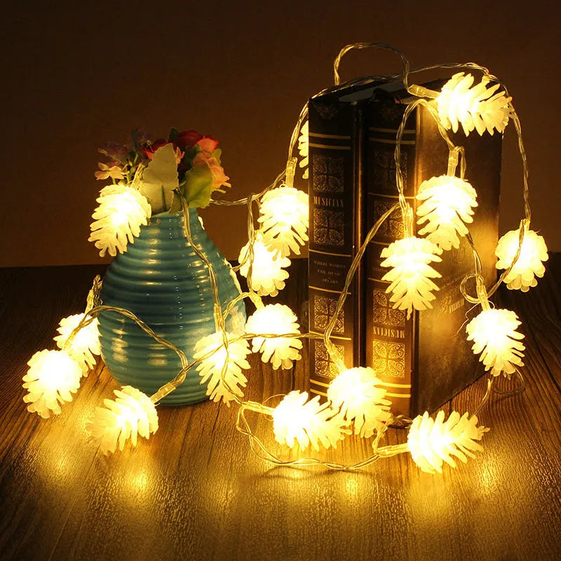 LED pine cone decorative light string with warm white bulbs and plastic shells, battery powered for flexible placement