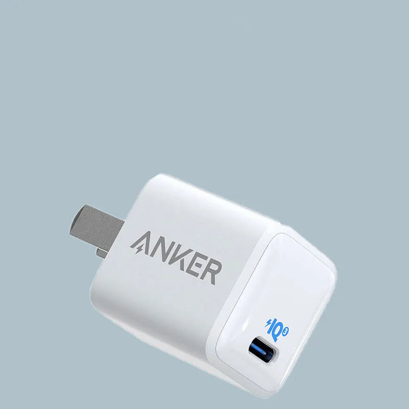 White 18W USB travel charger for fast charging mobile phones and devices