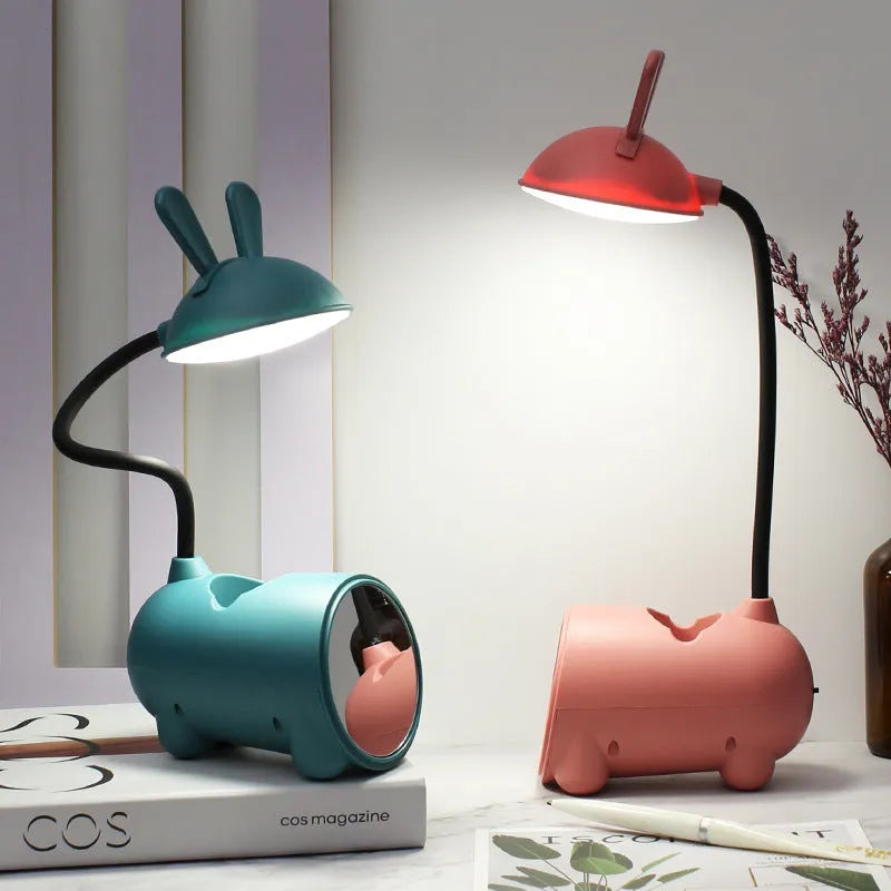 Cartoon USB desk lamp with pen storage container in dark blue colour on desktop