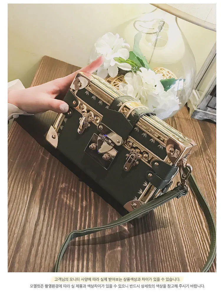 Black hard PU leather women's shoulder bag with flap design and single strap