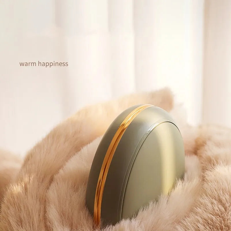 Brown portable USB power bank with hand warmer function showing size alongside data cable and velvet bag.