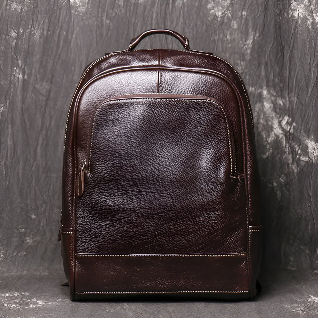 Men's leather handbag backpack in black first layer cowhide with multiple pockets and 30x12x42cm dimensions