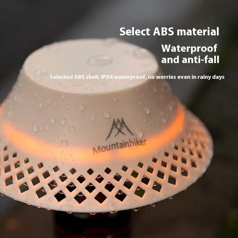 Beige wine bottle-shaped camping lantern with USB-C charging port and LED lights