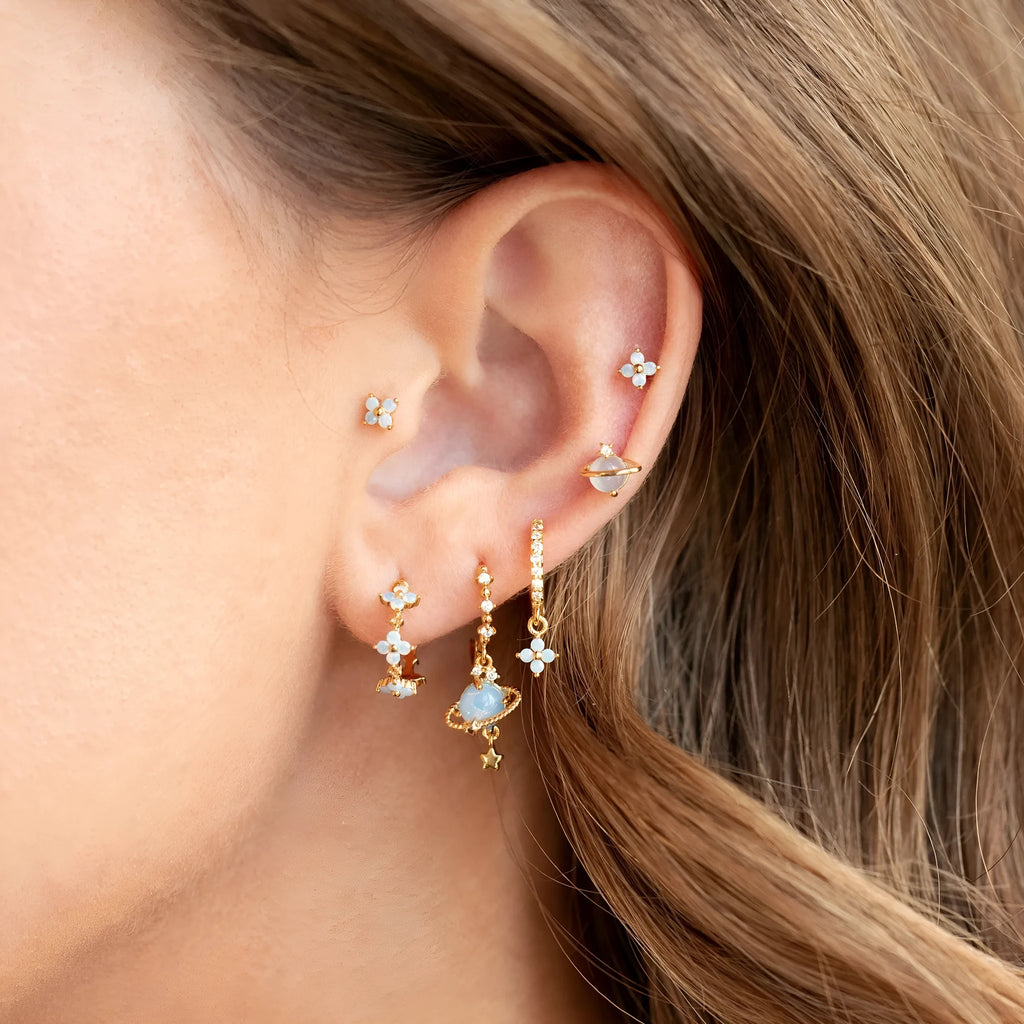 Gold and silver flower-shaped ear studs with zircon mosaic accents in Japanese Korean style