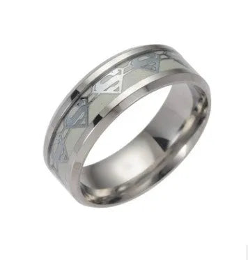 Stainless steel Batman ring with luminous glow in the dark finish in silver colour on a black background